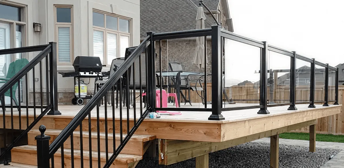 Handrail installation on a deck staircase for safety and code compliance in Tuscaloosa, AL