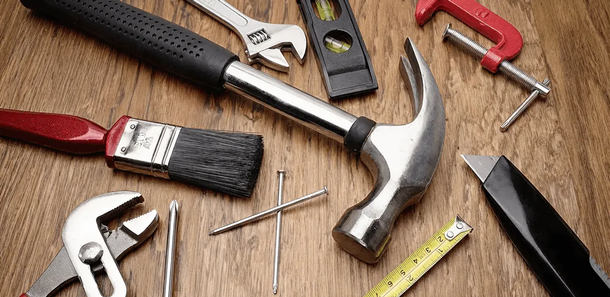 Handyman tools laid out for home repair and maintenance work in Tuscaloosa, AL
