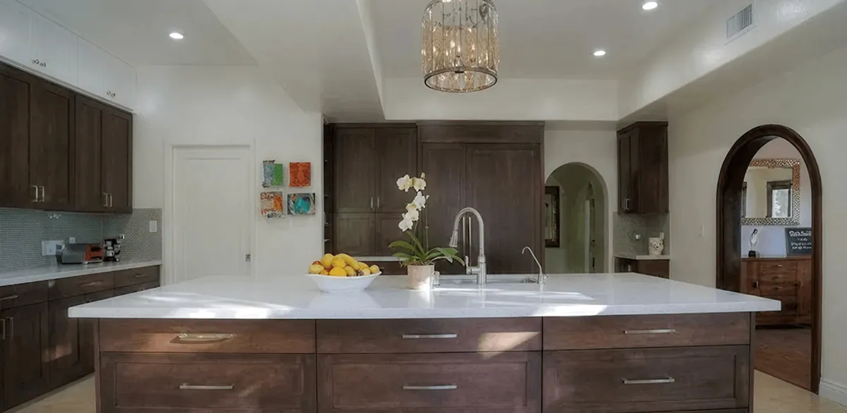 Cabinet refacing project with updated kitchen cabinets and island in Tuscaloosa, AL